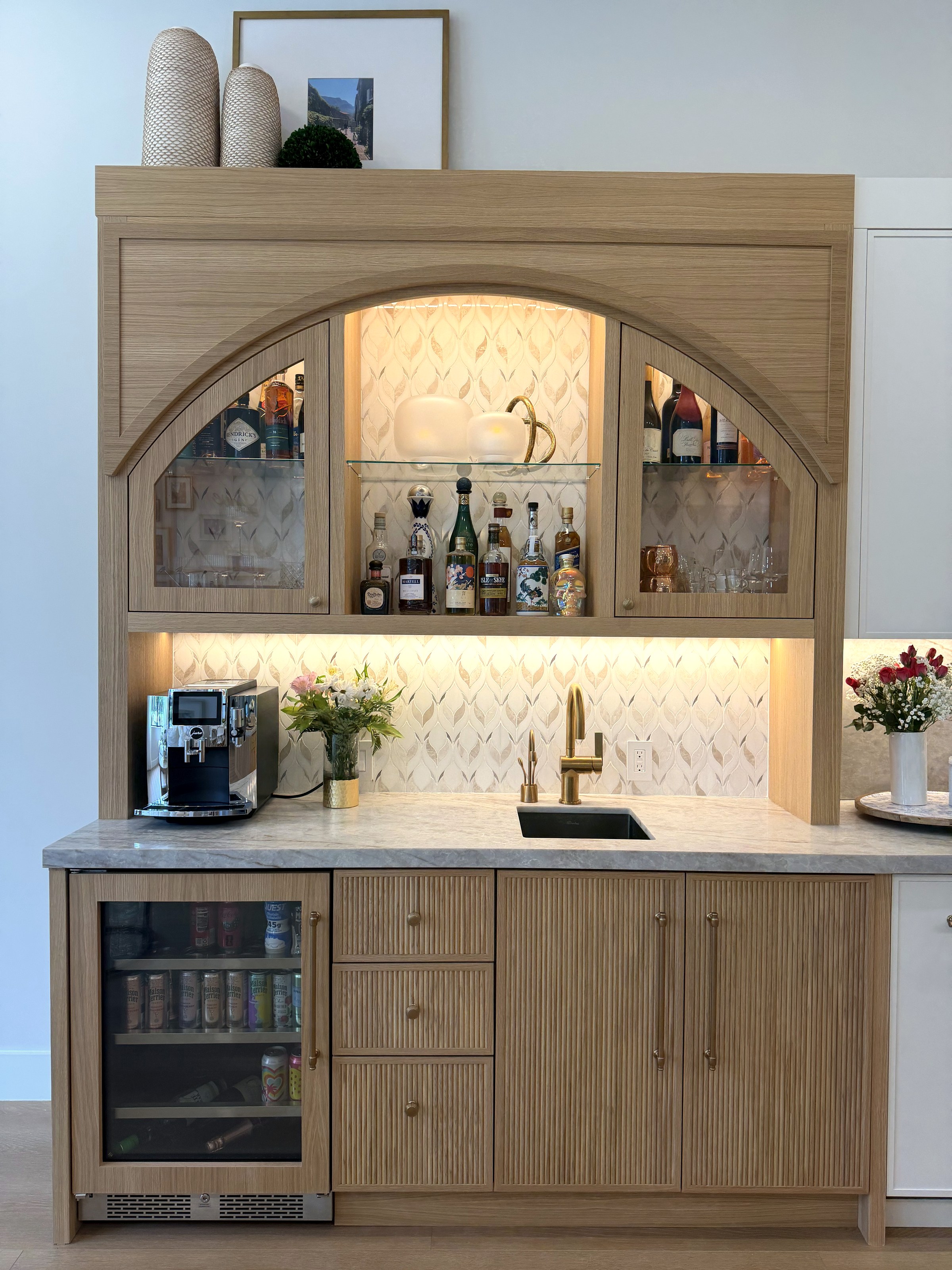 Finished custom arched wet bar installed in a South Florida home